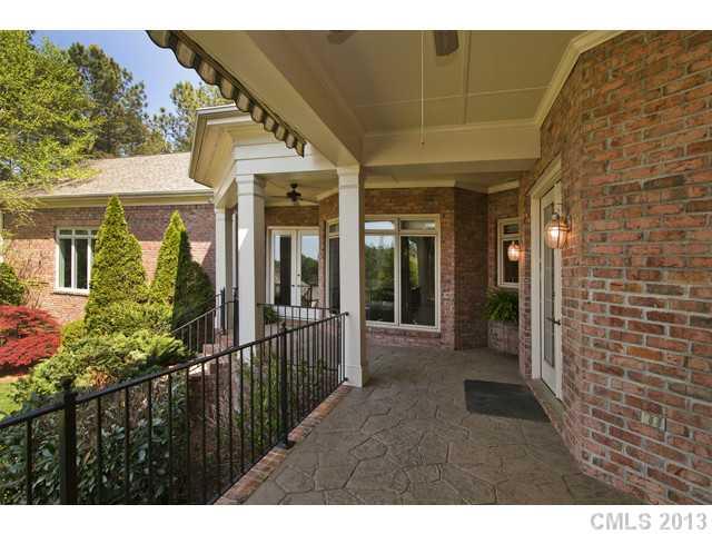 1709 Verdict Ridge Drive Denver, NC 28037 - Photo 14 of 16 a view of a porch with potted plants