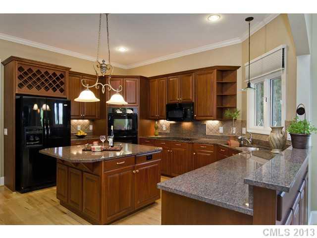 1709 Verdict Ridge Drive Denver, NC 28037 - Photo 6 of 16 a kitchen with a counter space cabinets and appliances