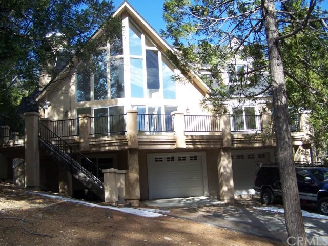 27502 West Shore Road Lake Arrowhead, CA 92352 - Photo 1 of 1 a view of a house with a patio