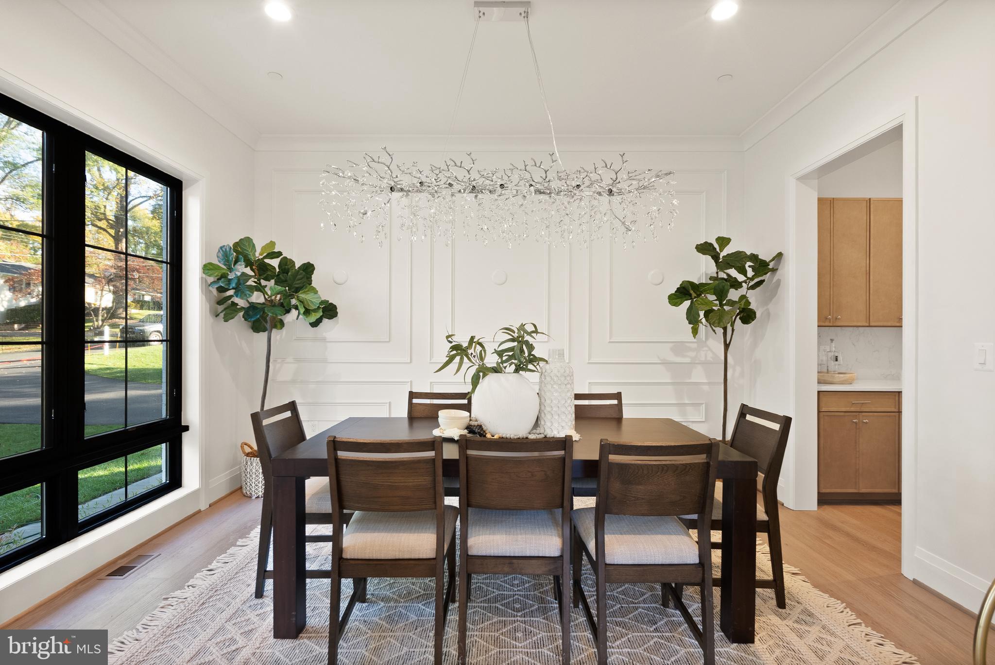 7806 Carteret Road Bethesda, MD 20817 - Photo 13 of 58 a view of a dining room with furniture window and wooden floor