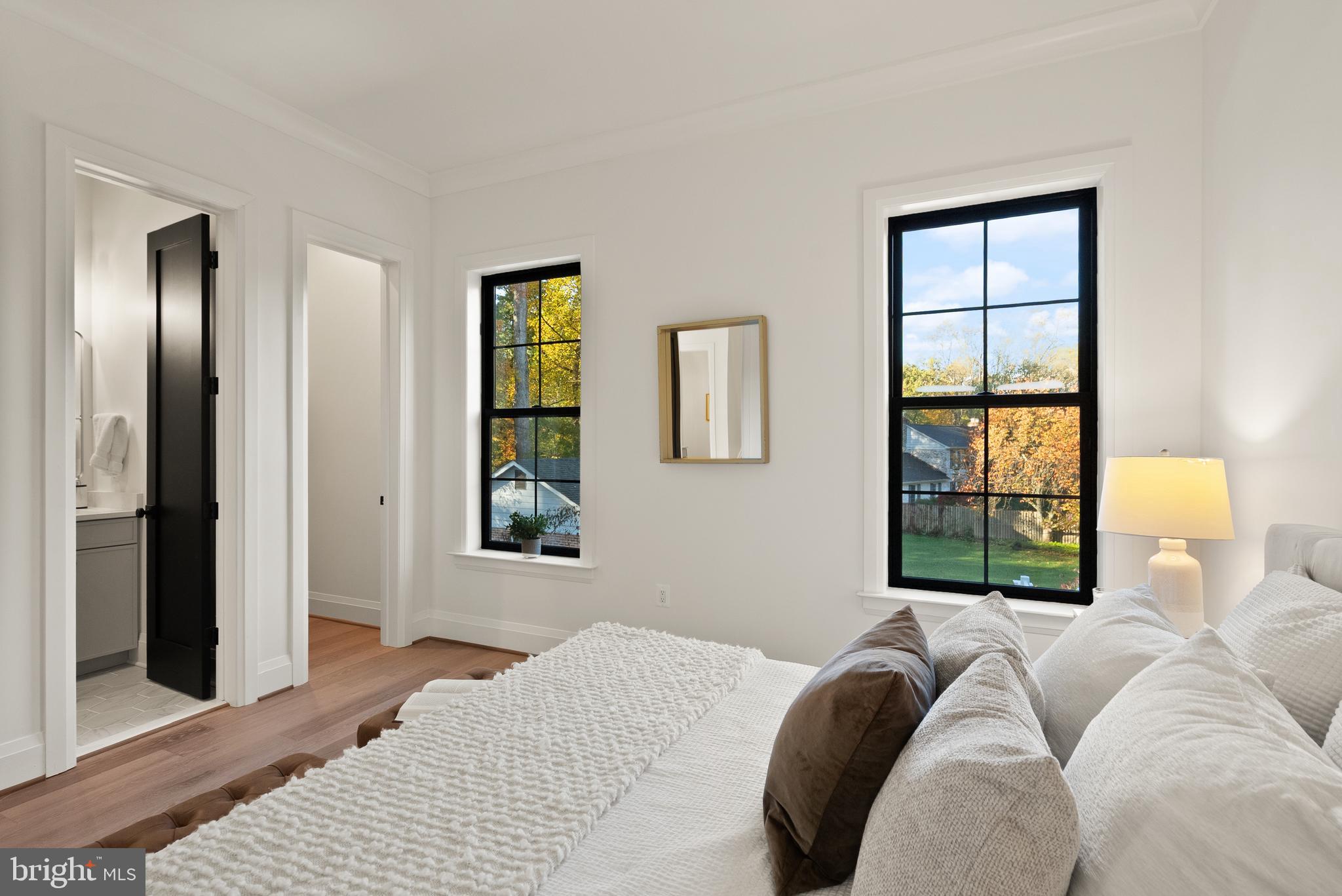 7806 Carteret Road Bethesda, MD 20817 - Photo 17 of 58 a bedroom with a bed and a window