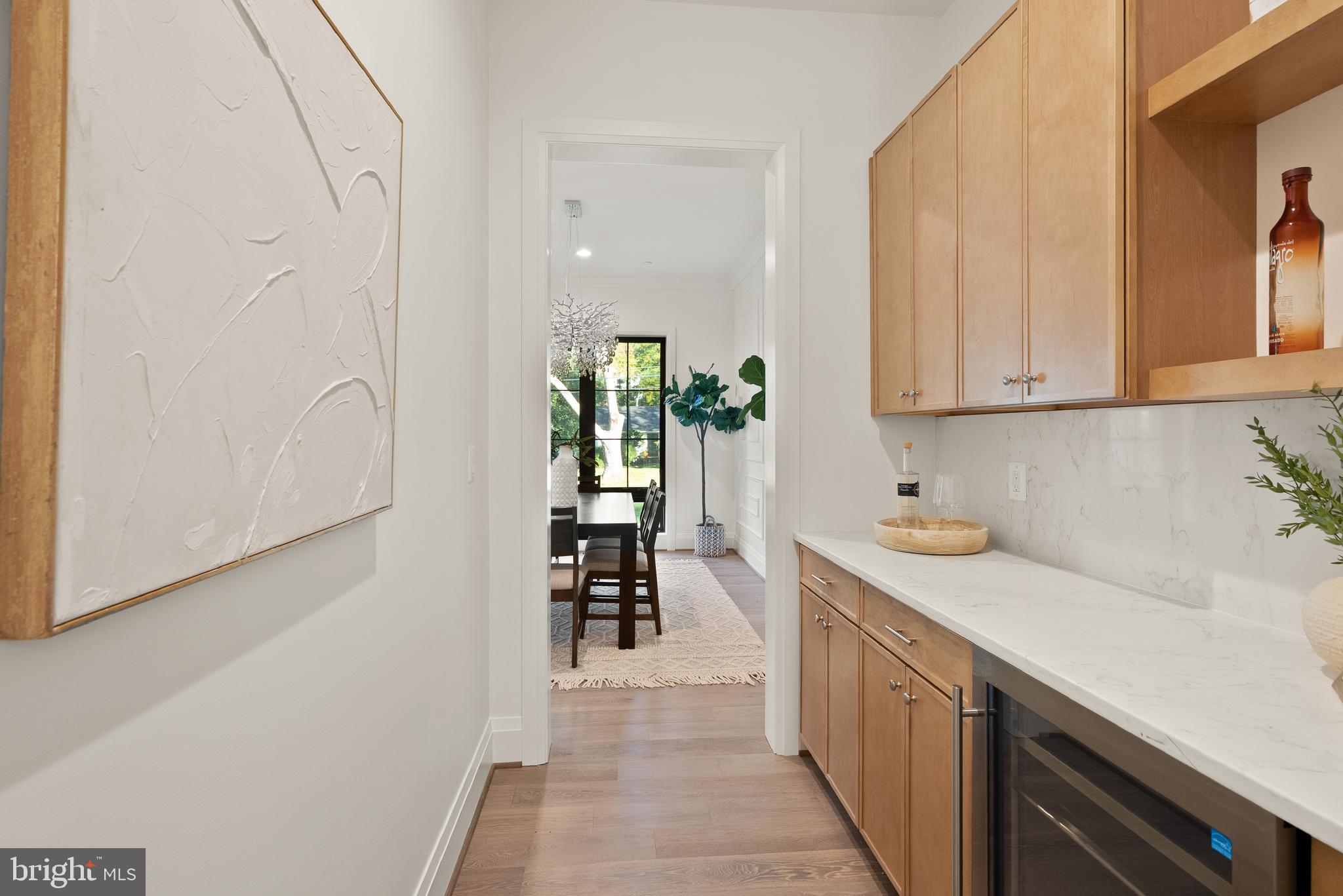 7806 Carteret Road Bethesda, MD 20817 - Photo 24 of 58 a kitchen with a sink and cabinets