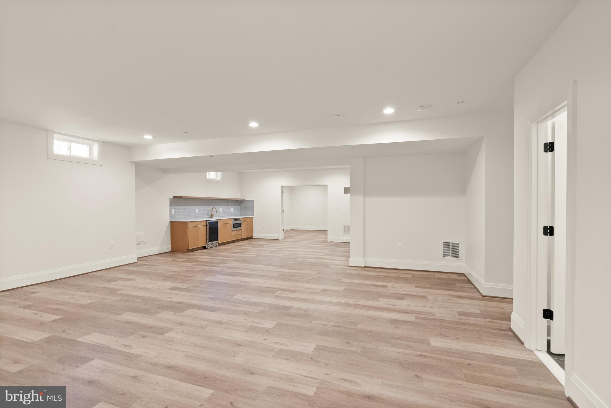 7806 Carteret Road Bethesda, MD 20817 - Photo 49 of 58 a view of empty room with wooden floor