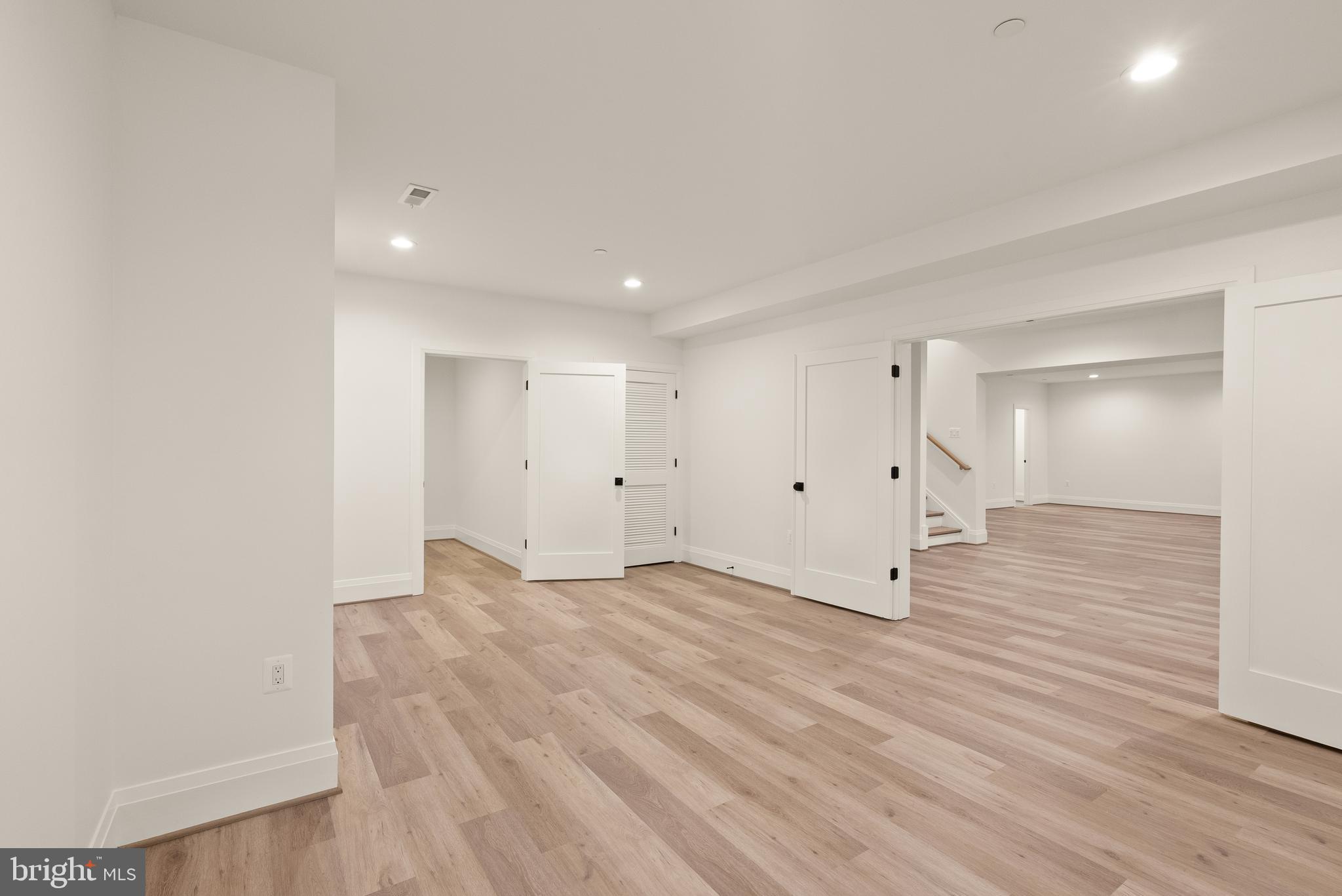 7806 Carteret Road Bethesda, MD 20817 - Photo 55 of 58 a view of empty room with wooden floor