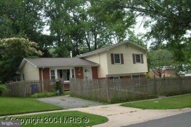 12501 Barbara Road Silver Spring, MD 20906 - Photo 1 of 1 a front view of a house with a garden