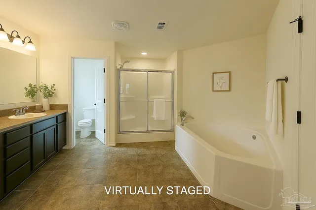 a bathroom with a bathtub sink and toilet