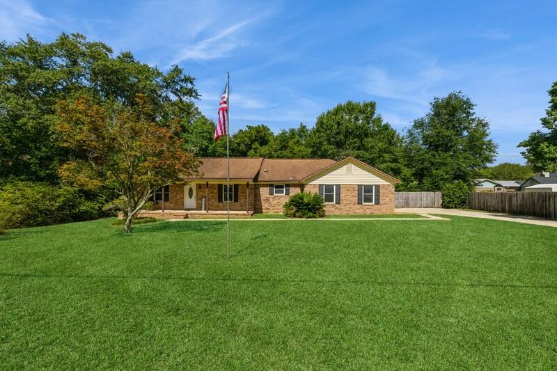 a view of a house with a big yard
