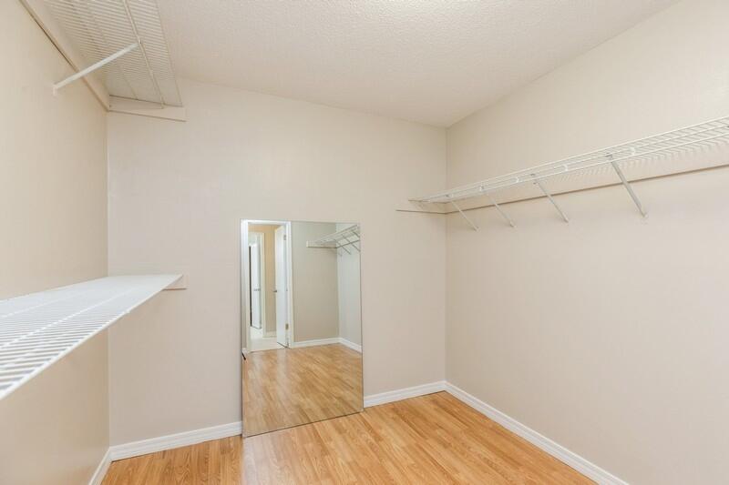 401 Ashley Drive Crestview, FL 32536 - Photo 21 of 36 a view of empty room with wooden floor and fan