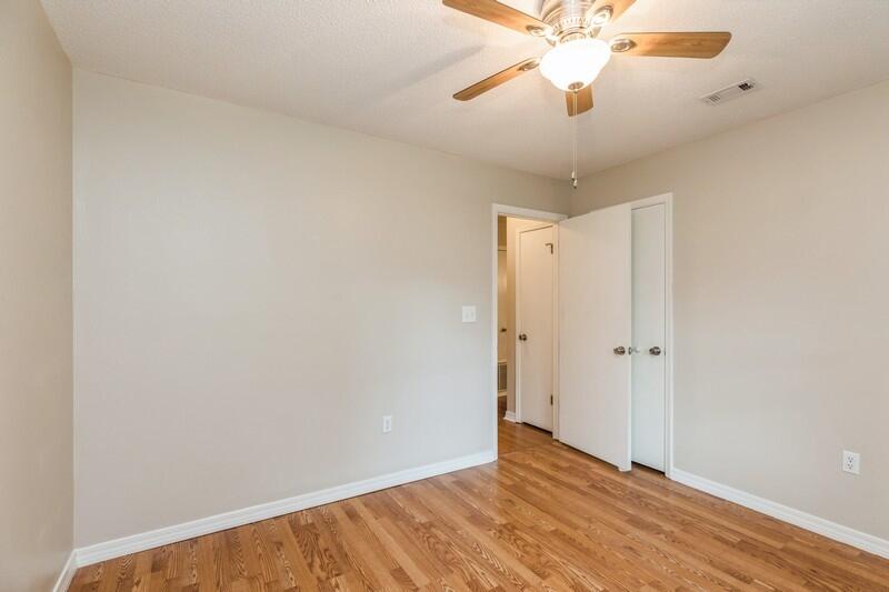 401 Ashley Drive Crestview, FL 32536 - Photo 26 of 36 a view of an empty room and chandelier fan