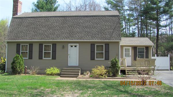 73 Strong Road Southampton, MA 01073 - Photo 1 of 19 a front view of a house with a yard