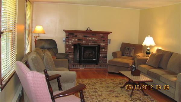 73 Strong Road Southampton, MA 01073 - Photo 3 of 19 a living room with furniture and a fireplace