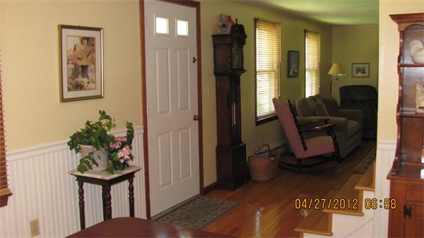 73 Strong Road Southampton, MA 01073 - Photo 4 of 19 a view of a hallway with workspace and a living room
