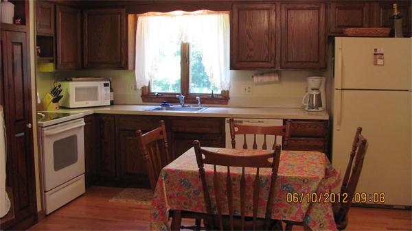 73 Strong Road Southampton, MA 01073 - Photo 6 of 19 a kitchen with stainless steel appliances granite countertop a stove a sink dishwasher and a refrigerator