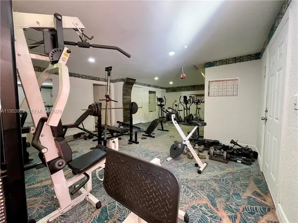a view of a room with gym equipment