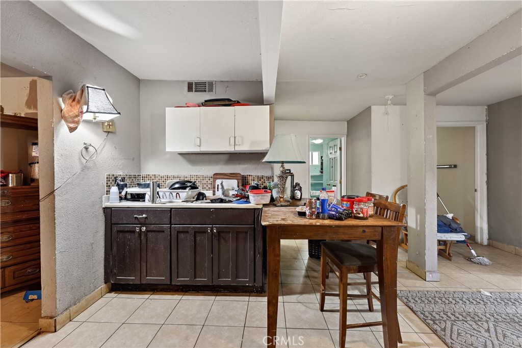 1862 Dunn Road Merced, CA 95340 - Photo 7 of 15 a kitchen with a sink and cabinets