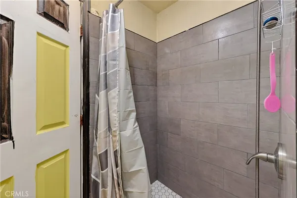a view of a bathroom from the hallway