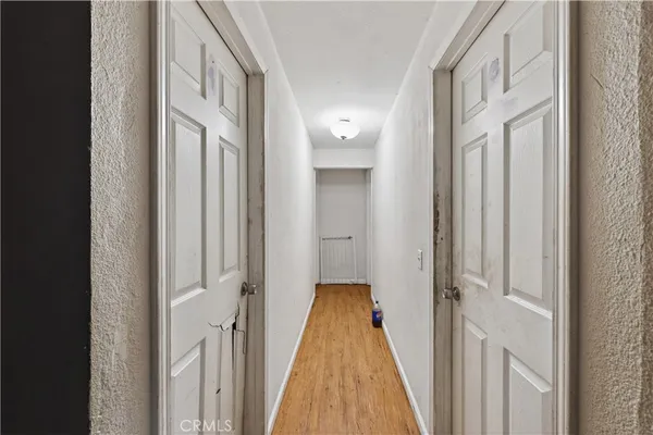 a view of grassy field with trees