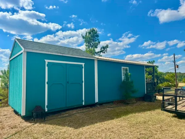 a view of a house with a porch
