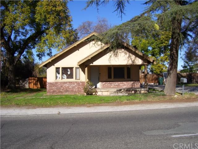 4975 Central Avenue Riverside, CA 92504 - Photo 1 of 1 a front view of a house with a garden and porch
