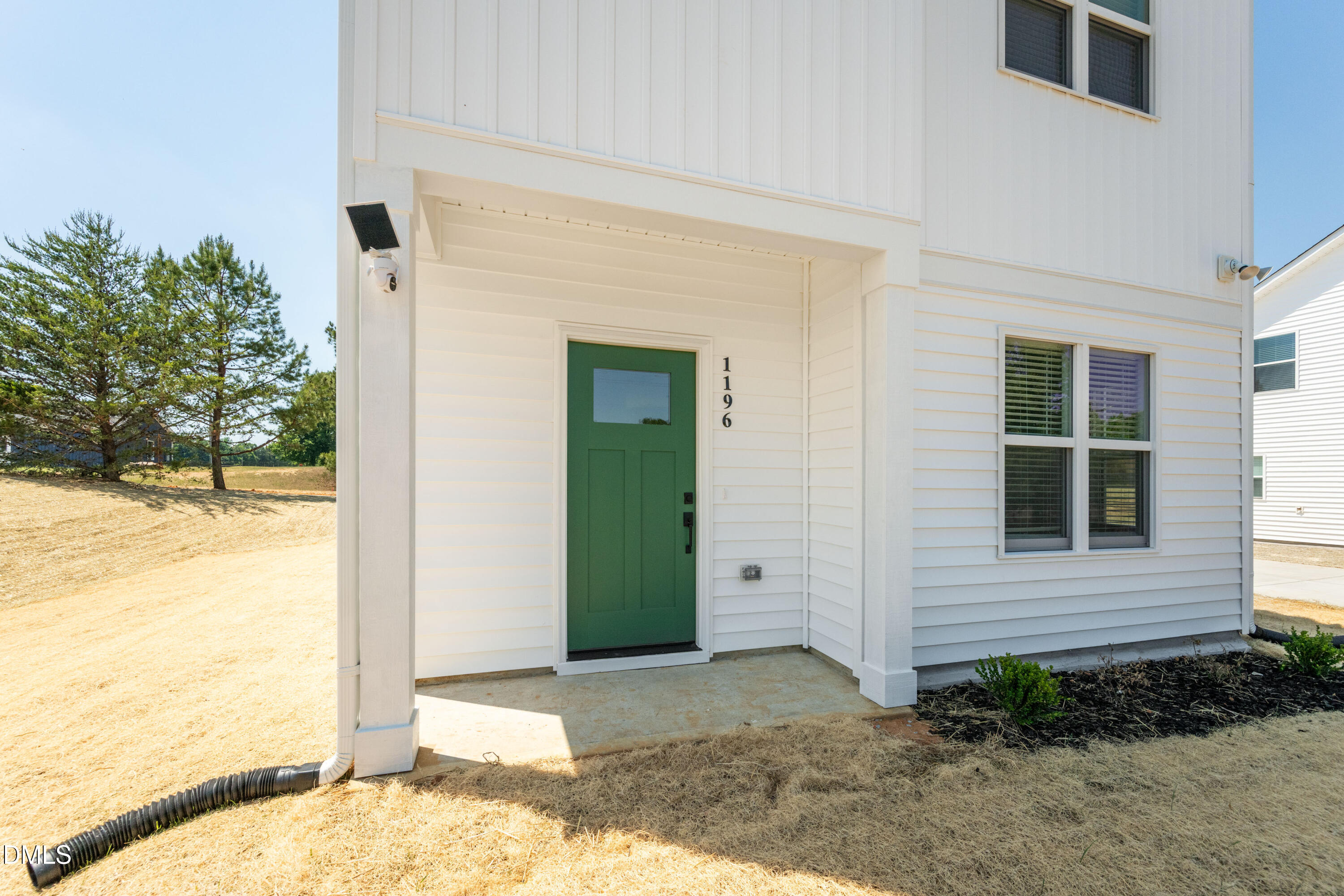 1196 Hurdle Mills Road Roxboro, NC 27573 - Photo 7 of 50 a view of front door of house