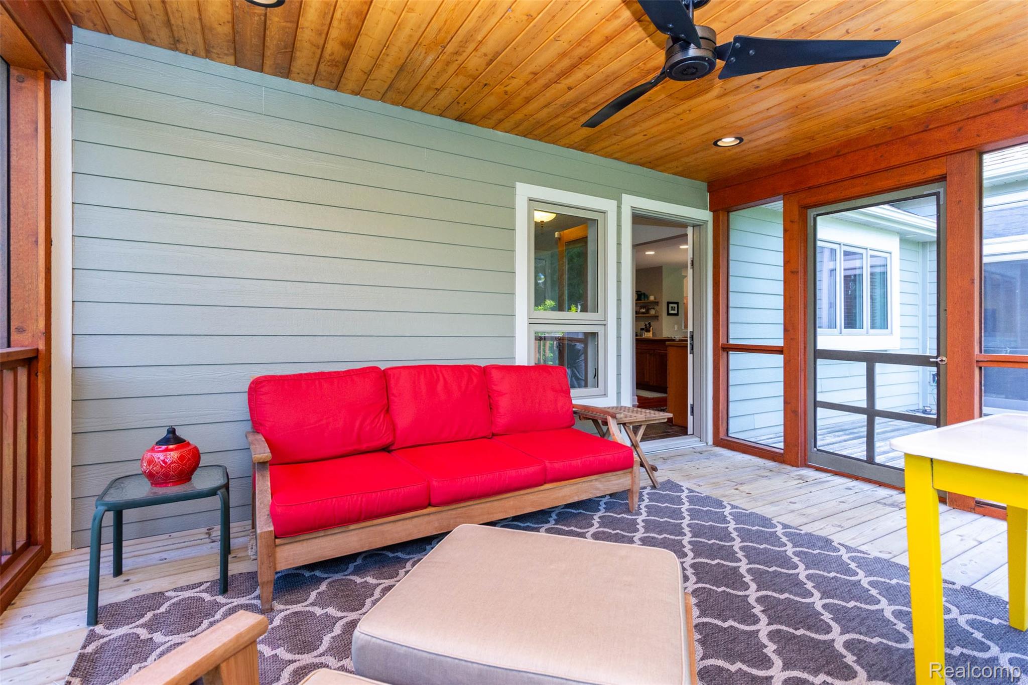 9887 Hadley Road Clarkston, MI 48348 - Photo 29 of 56 Screened porch featuring light green siding and a natural wood-finish ceiling with recessed lighting