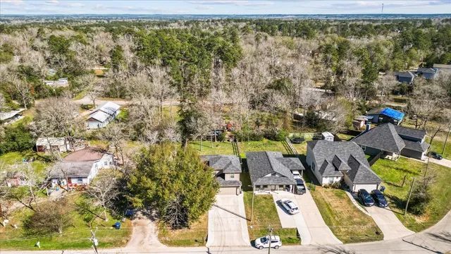 an aerial view of residential building with parking space