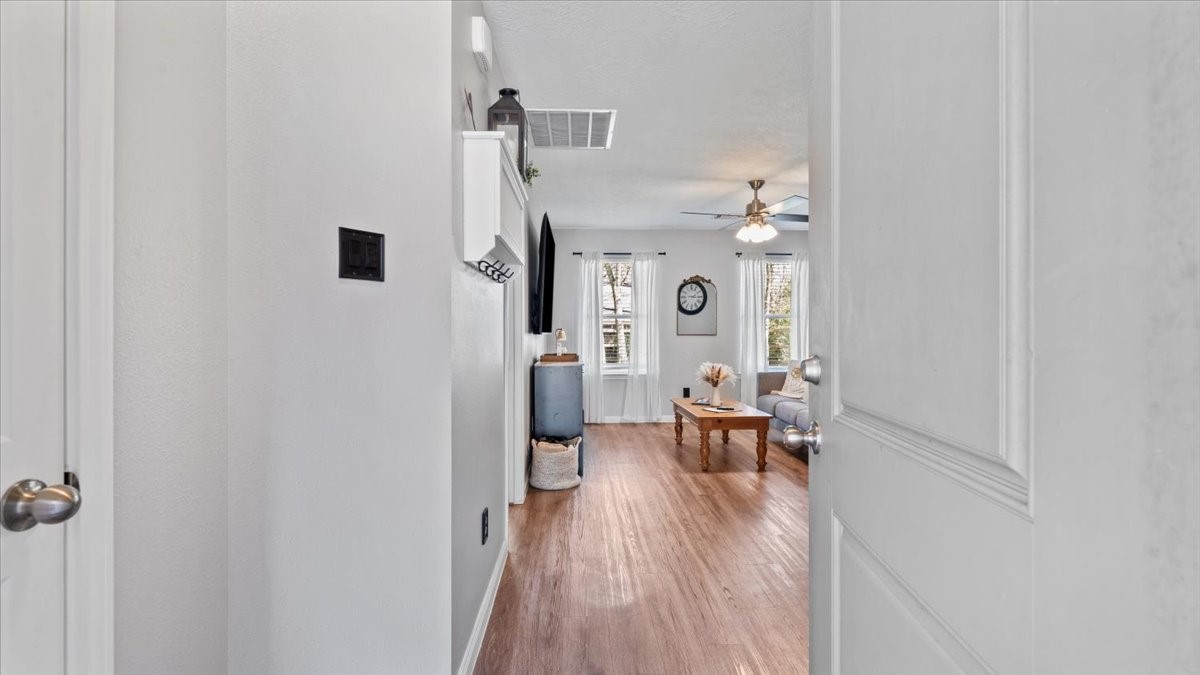 3975 Sam Houston Road Willis, TX 77378 - Photo 38 of 38 a view of a livingroom with furniture and hardwood floor