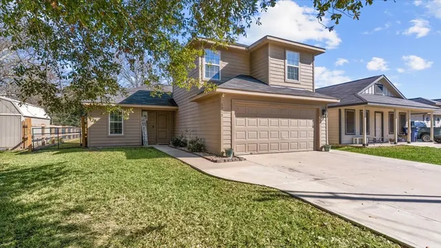 front view of a house with a yard