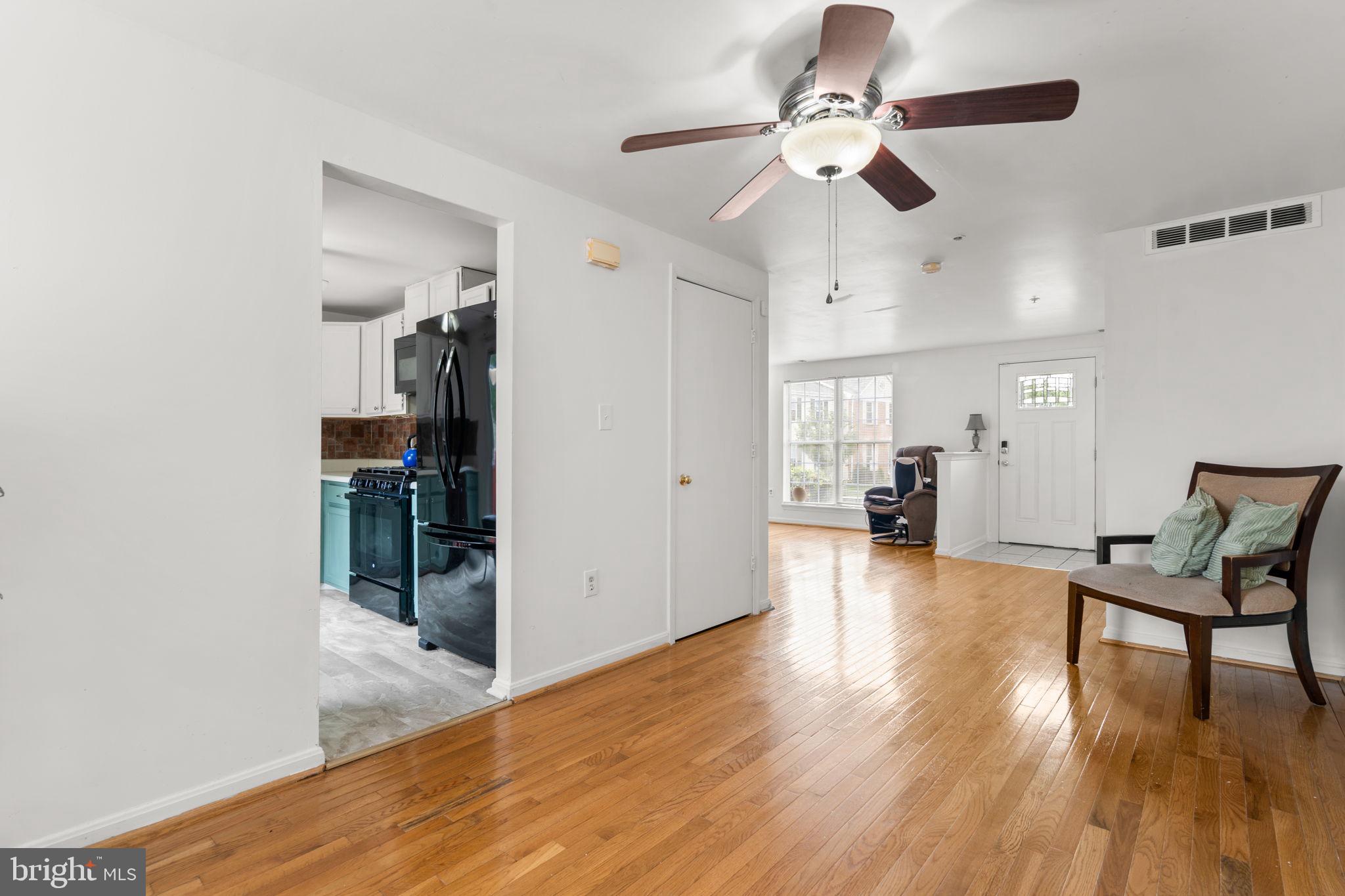 5136 Cranmer Way Capitol Heights, MD 20743 - Photo 12 of 28 a view of livingroom and hardwood floor
