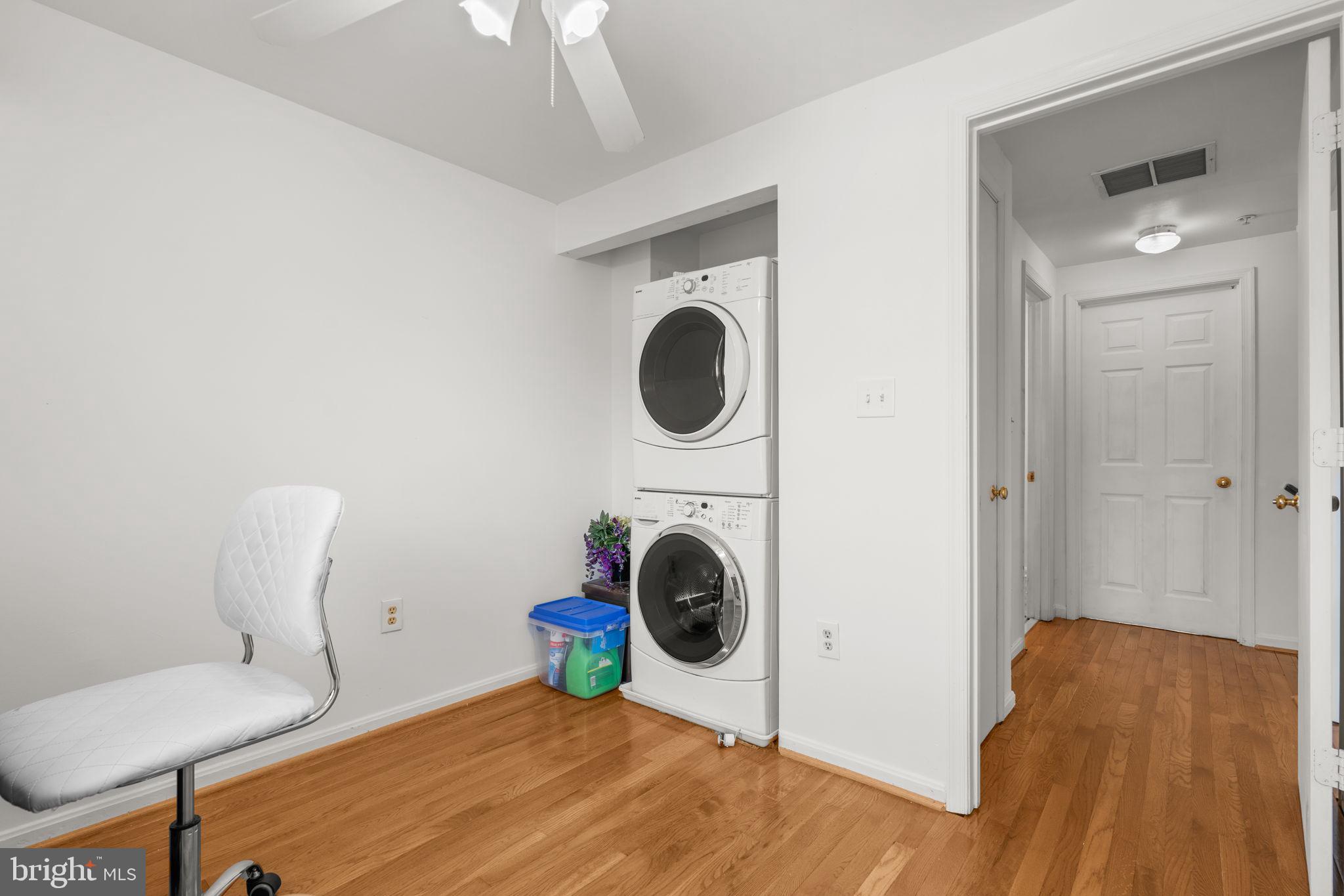 5136 Cranmer Way Capitol Heights, MD 20743 - Photo 20 of 28 a room with a walk in closet and wooden floor