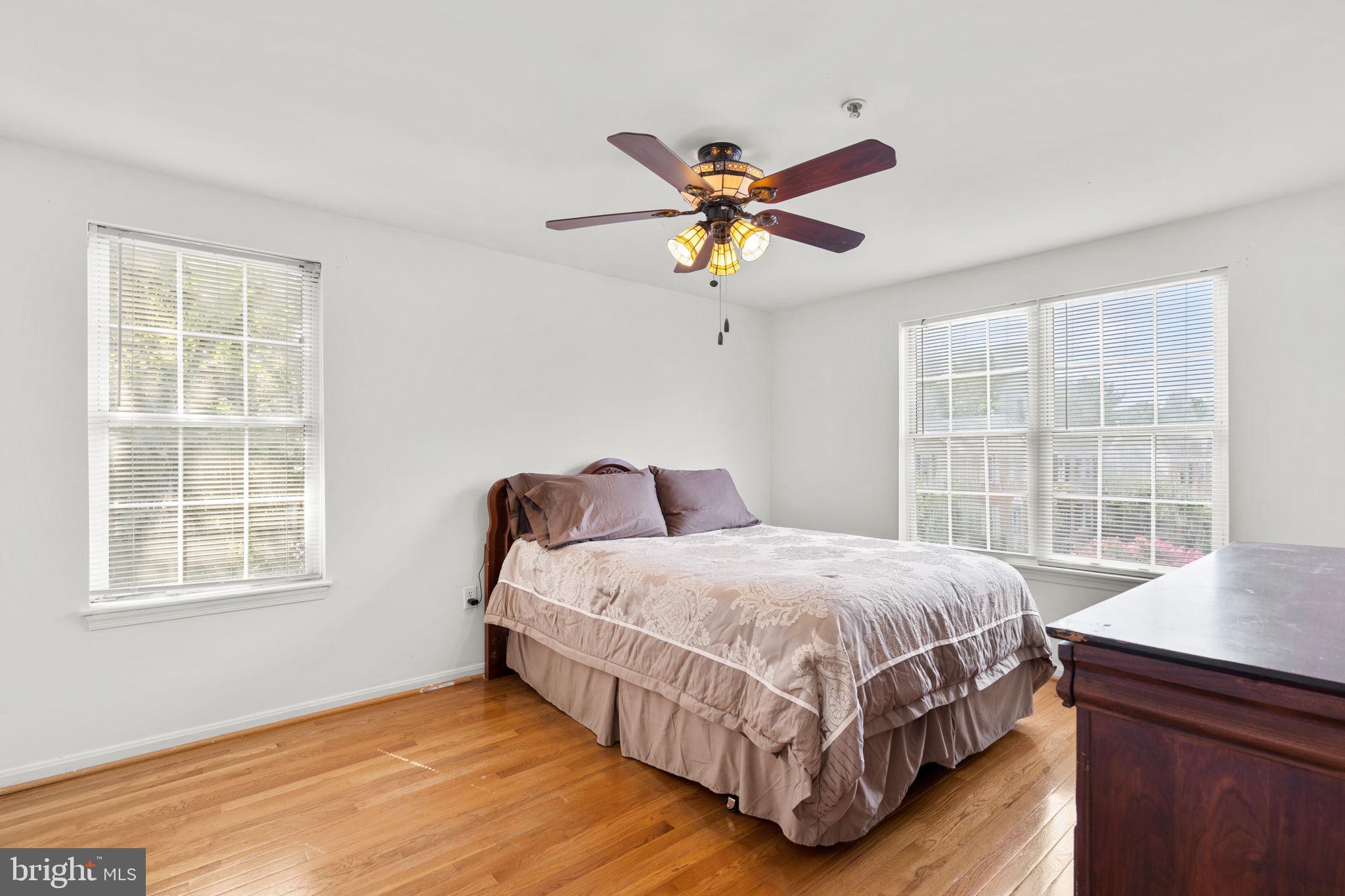 5136 Cranmer Way Capitol Heights, MD 20743 - Photo 21 of 28 a bedroom with a bed and windows
