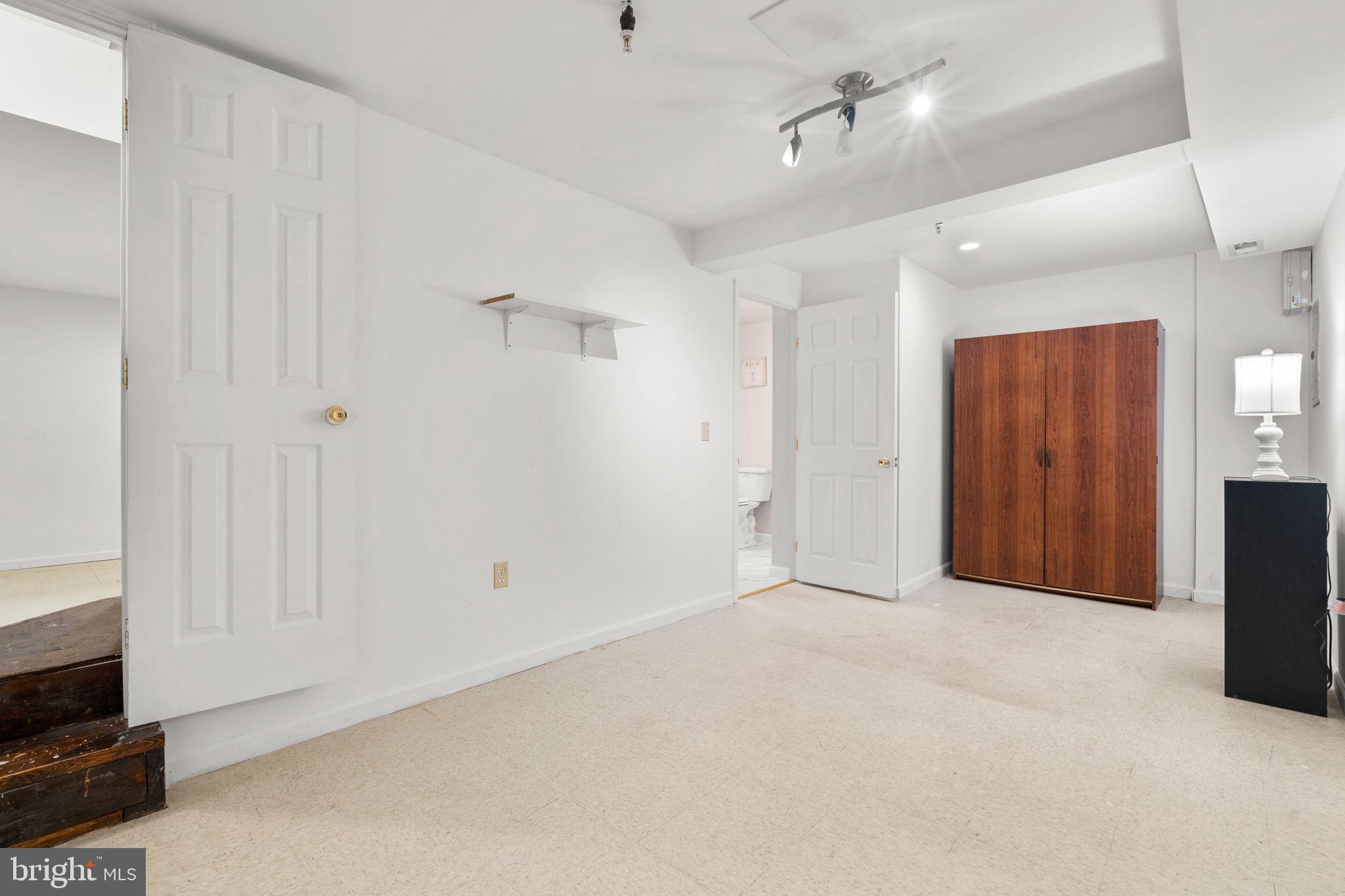 5136 Cranmer Way Capitol Heights, MD 20743 - Photo 25 of 28 a view of an empty room with a fireplace
