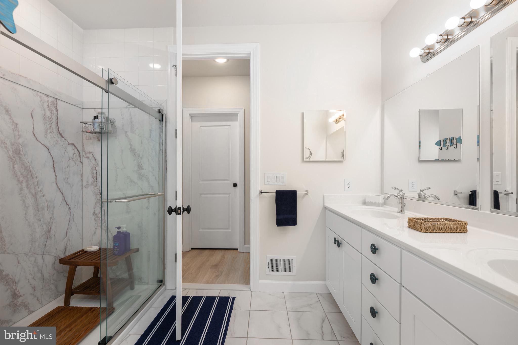 20382 Hopkins Road Lewes, DE 19958 - Photo 21 of 43 Primary Bath, Tile Floors, Glass Shower Doors