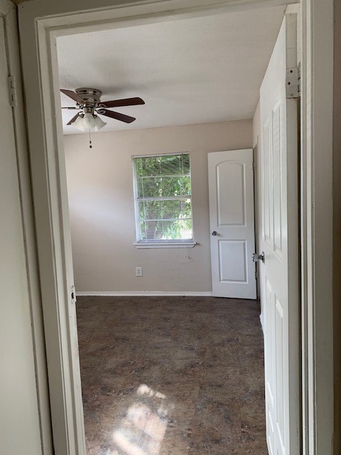 7812 Tierwester Street, Unit 107 Houston, TX 77021 - Photo 4 of 13 an empty room with windows