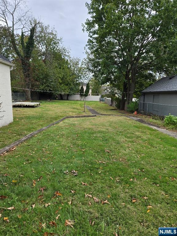 684 Edgewater Avenue, Unit 1 Ridgefield, NJ 07657 - Photo 18 of 20 a view of a field of grass and trees