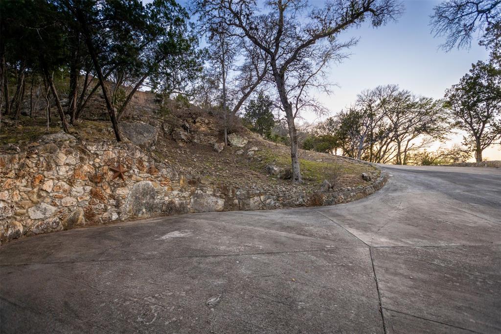 5135 Lookout Ridge Drive Marble Falls, TX 78654 - Photo 14 of 33 Driveway from Barn area down to the Lake Travis access.