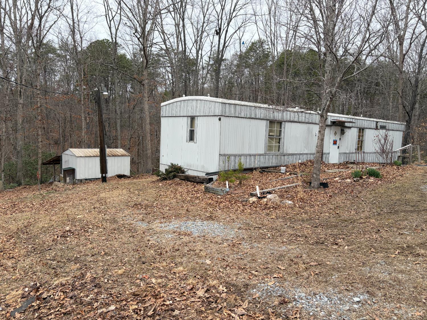 819 1 Mile Road Evington, VA 24550 - Photo 2 of 8 a view of a backyard