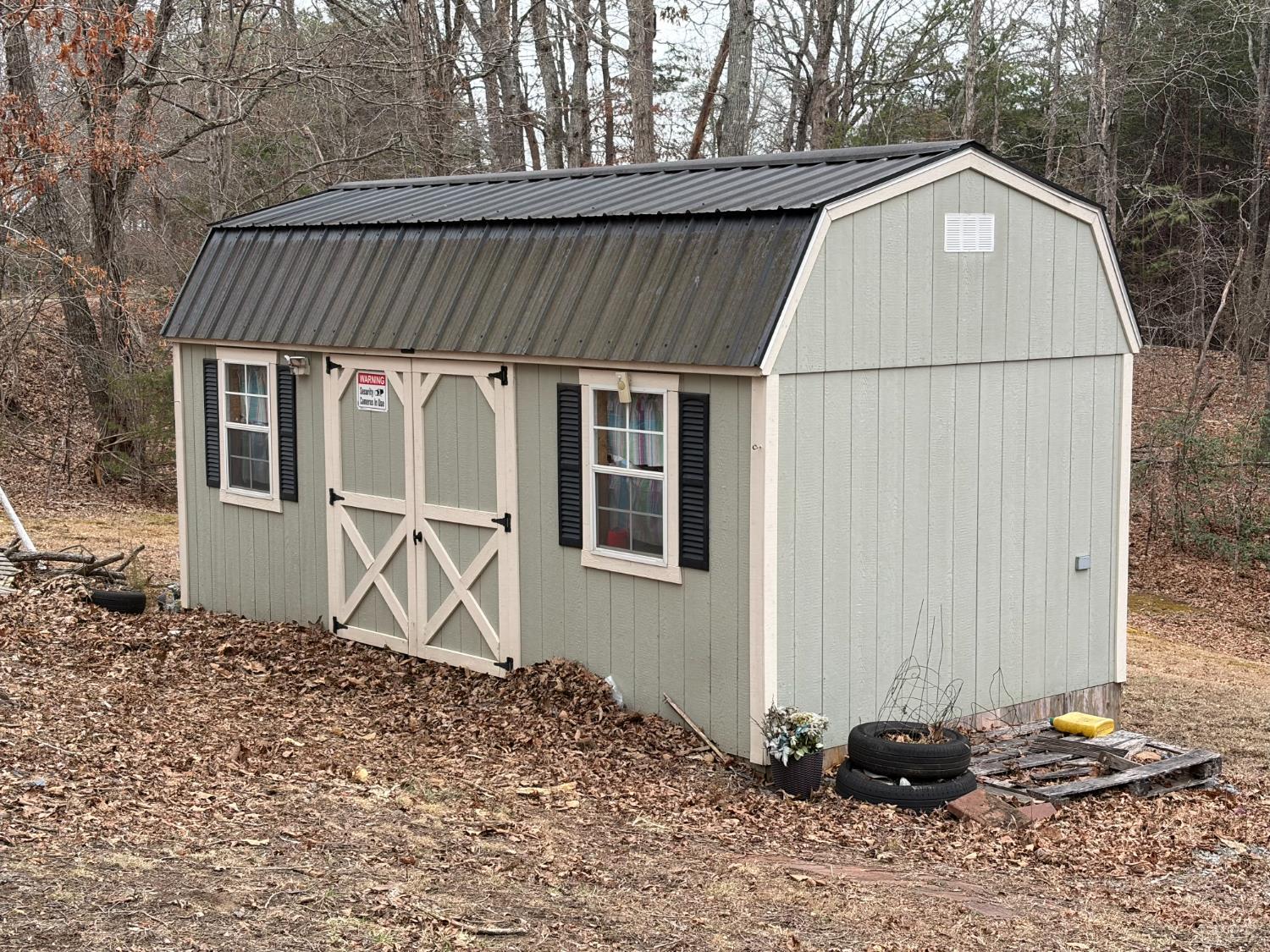 819 1 Mile Road Evington, VA 24550 - Photo 3 of 8 a backyard of a house with lots of green space