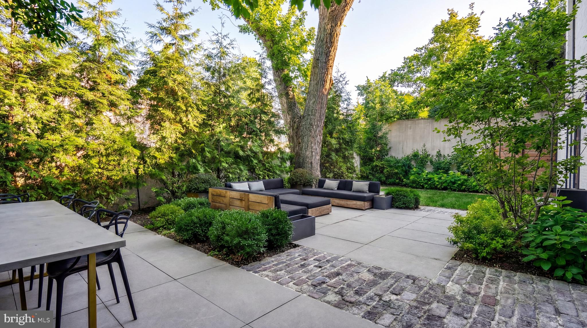 2709 36th Street Northwest Washington, DC 20007 - Photo 18 of 50 a view of a backyard with sitting area