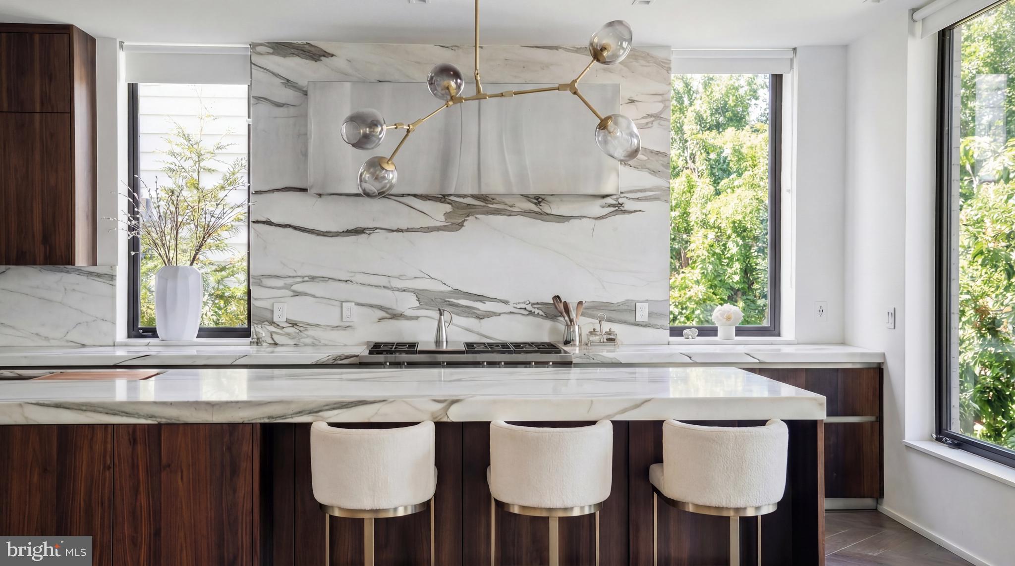 2709 36th Street Northwest Washington, DC 20007 - Photo 19 of 50 a kitchen with stainless steel appliances a sink and a window