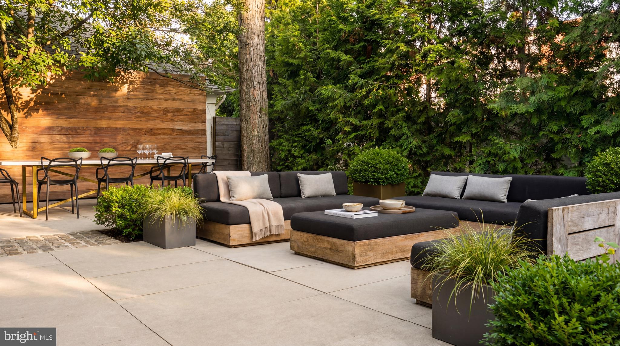 2709 36th Street Northwest Washington, DC 20007 - Photo 44 of 50 a roof deck with couches and potted plants