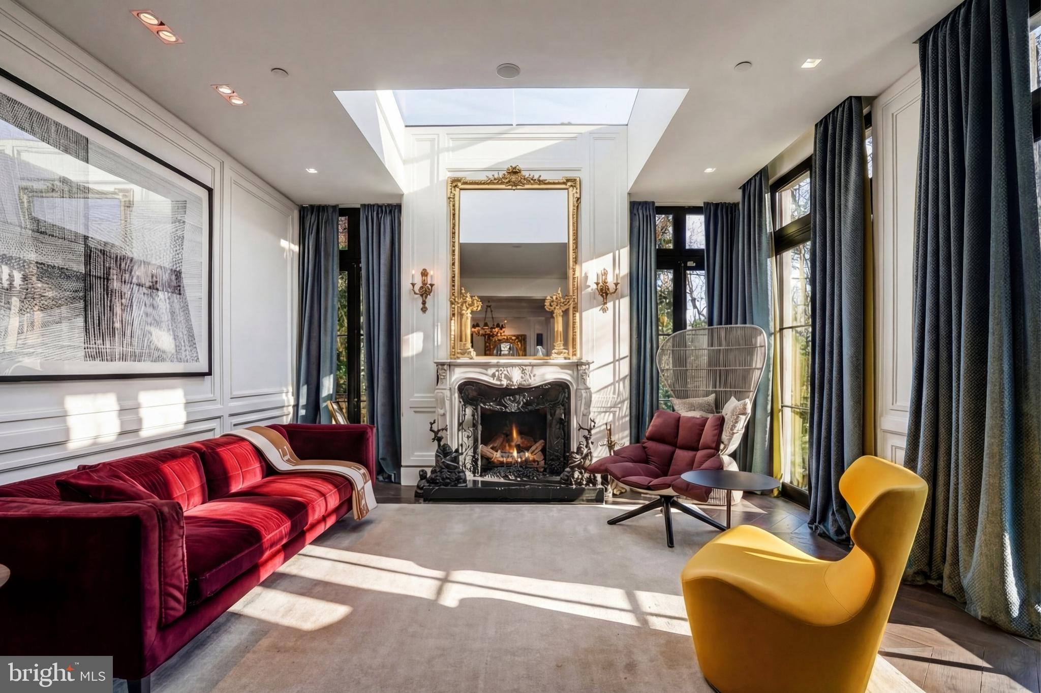 2709 36th Street Northwest Washington, DC 20007 - Photo 7 of 50 a living room with furniture and a fireplace