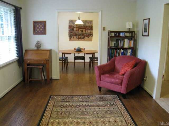 6307 Brandywine Road Raleigh, NC 27607 - Photo 2 of 12 a living room with furniture rug and window