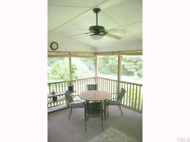 6307 Brandywine Road Raleigh, NC 27607 - Photo 3 of 12 a view of a dining room with a table and chairs