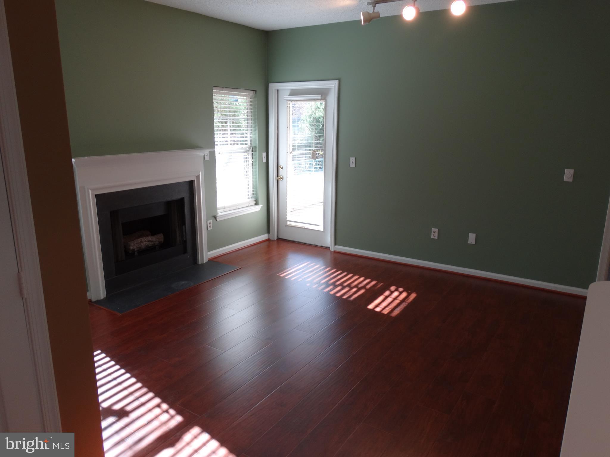 12009 Taliesin Place, Unit 13 Reston, VA 20190 - Photo 3 of 24 Living Room