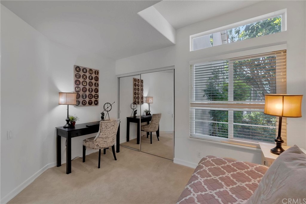 5639 Spinnaker Bay Drive Long Beach, CA 90803 - Photo 20 of 27 a bedroom with furniture and a window