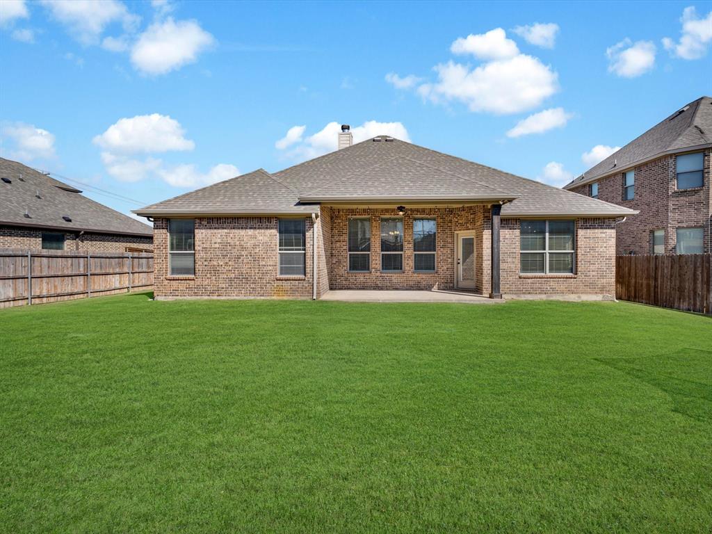 206 Brighton Court Midlothian, TX 76065 - Photo 15 of 15 a view of a house with a backyard