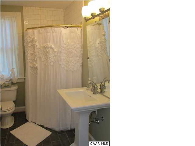 5585 Stony Point Road Barboursville, VA 22923 - Photo 8 of 28 a bathroom with a sink and a mirror