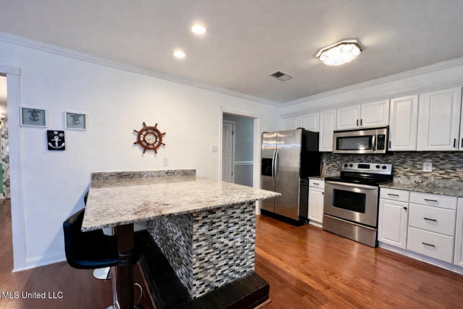 29129 J P Ladner Road Pass Christian, MS 39571 - Photo 6 of 24 kitchen