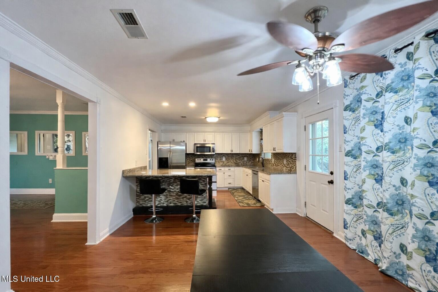 29129 J P Ladner Road Pass Christian, MS 39571 - Photo 8 of 24 dinning room-kitchen